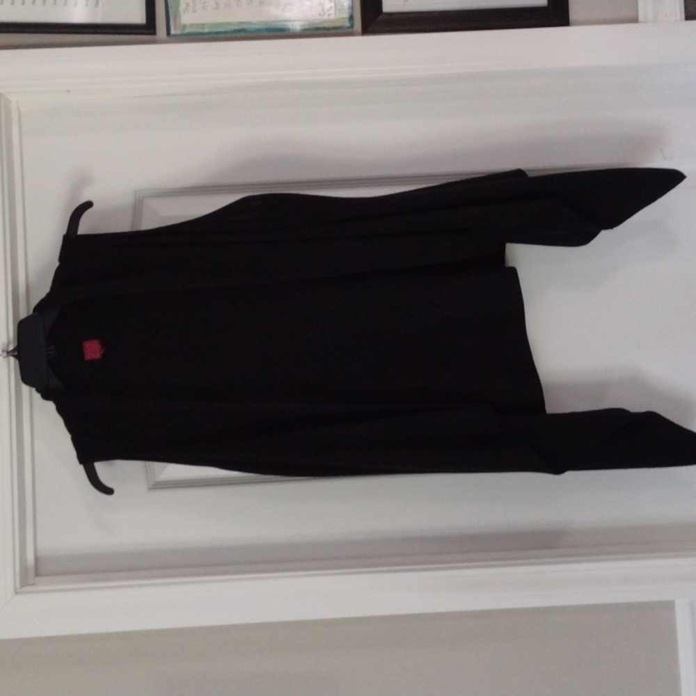 Sweater vest with long tails on sides